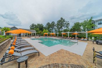 Expansive swimming pool with sundeck